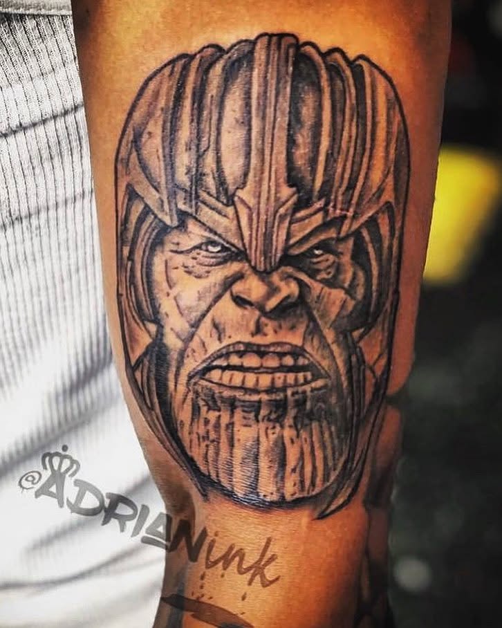 Thanos realism tattoo on the forearm by Adrian Shan Carr