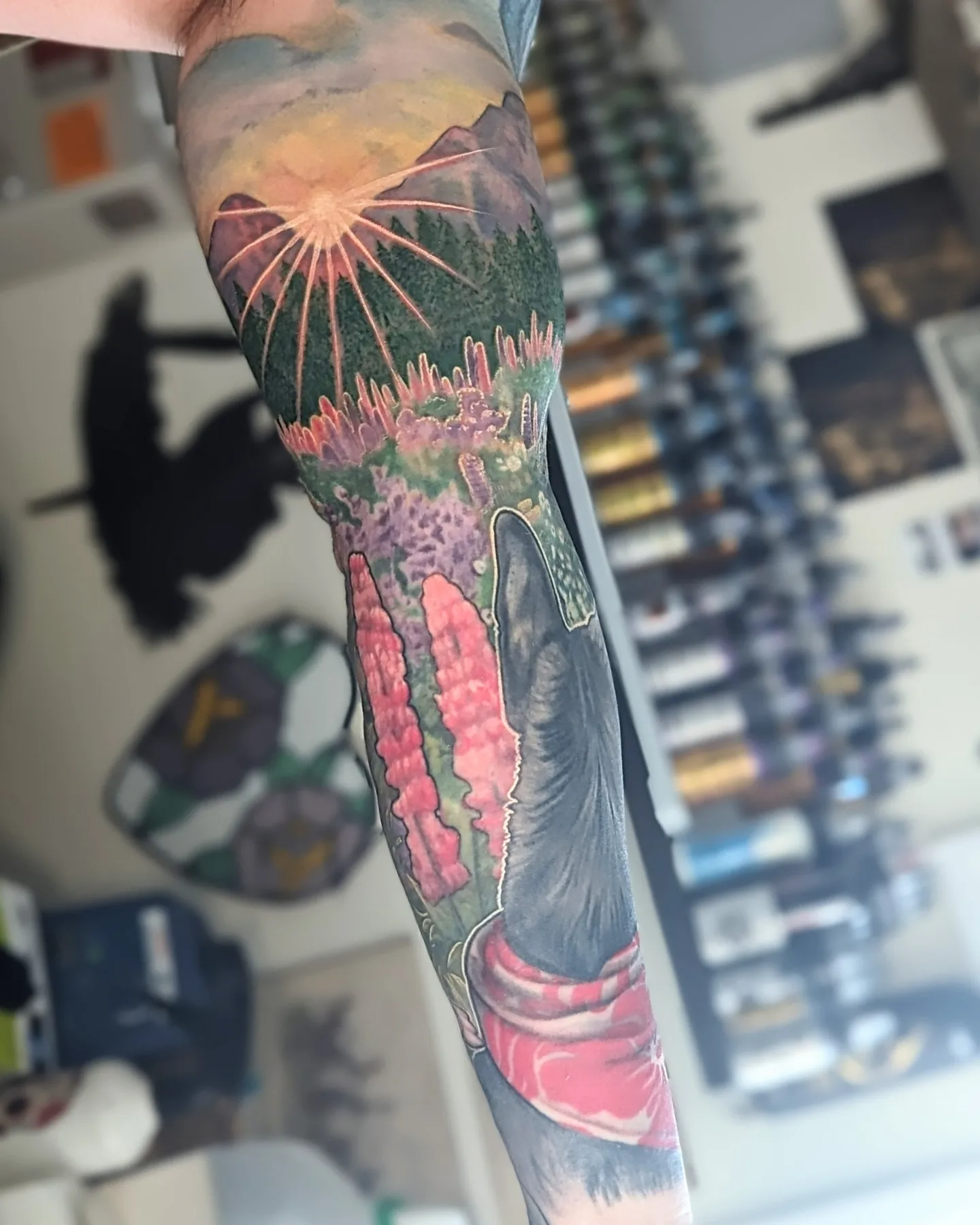 Landscape with mountain and sun realism tattoo on the forearm by Jay Trip