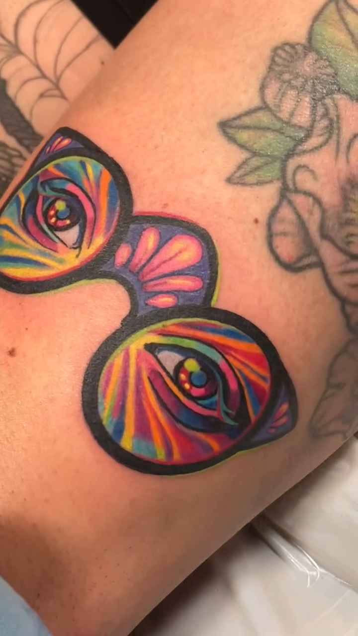 Psychedelic glasses with eyes new school tattoo by Sienna Coppa