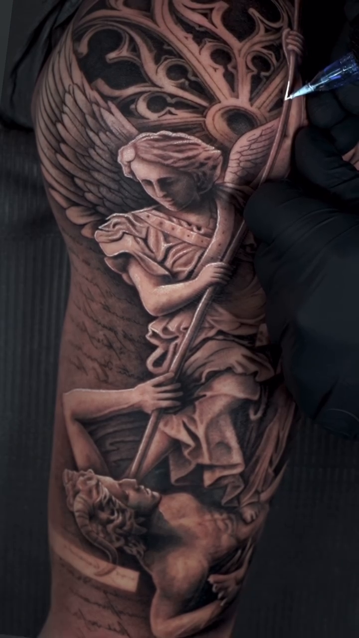 Angel with sword and shield realism tattoo by Jesus Alonso