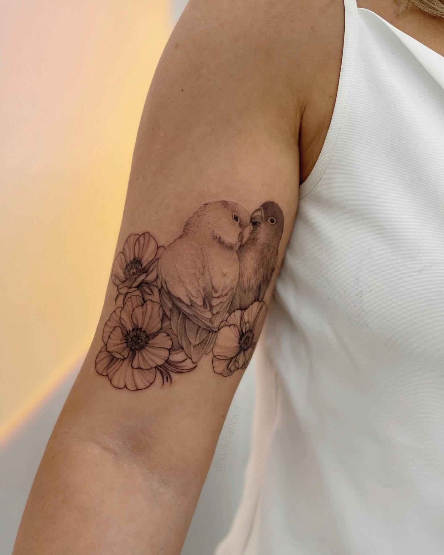 Birds and flowers realism tattoo on the forearm by Anastasiia Pakhanova ♥ tattoo artist