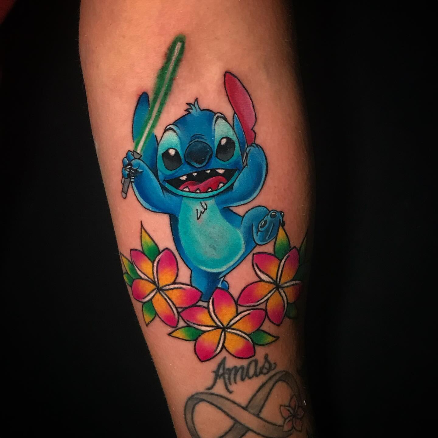 Stitch with flowers new school tattoo on the forearm by Bruce becerra tattoos