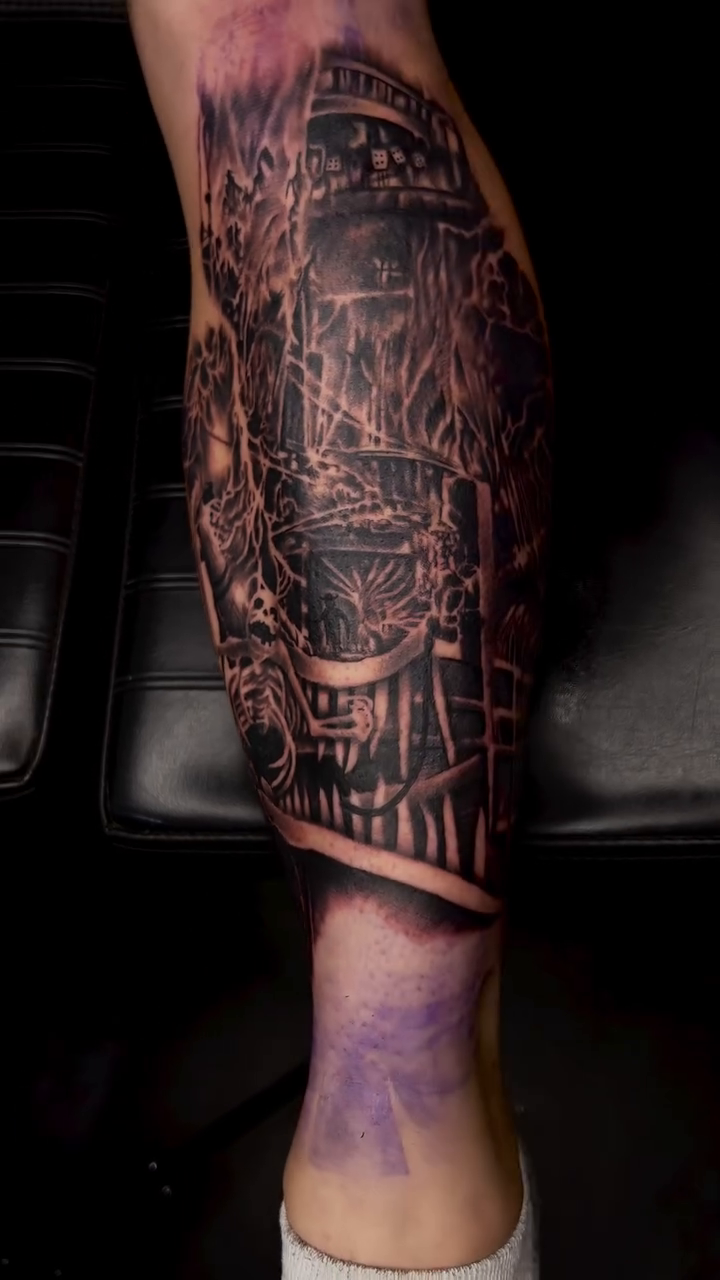 Tattoo by @mrgrouchtattoos — dark_realism, black_and_grey