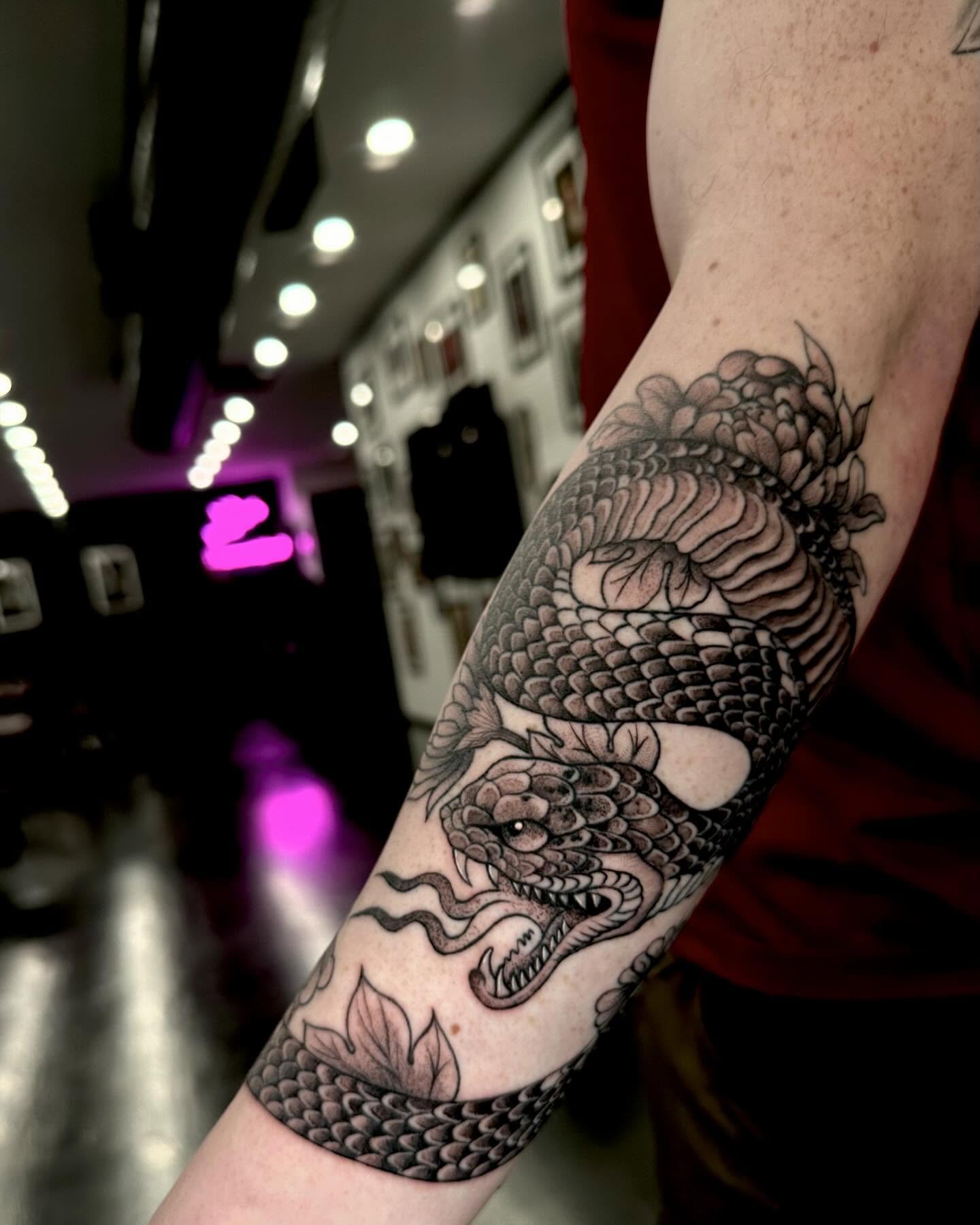 Dragon black and grey tattoo on the forearm by Dayana✨
