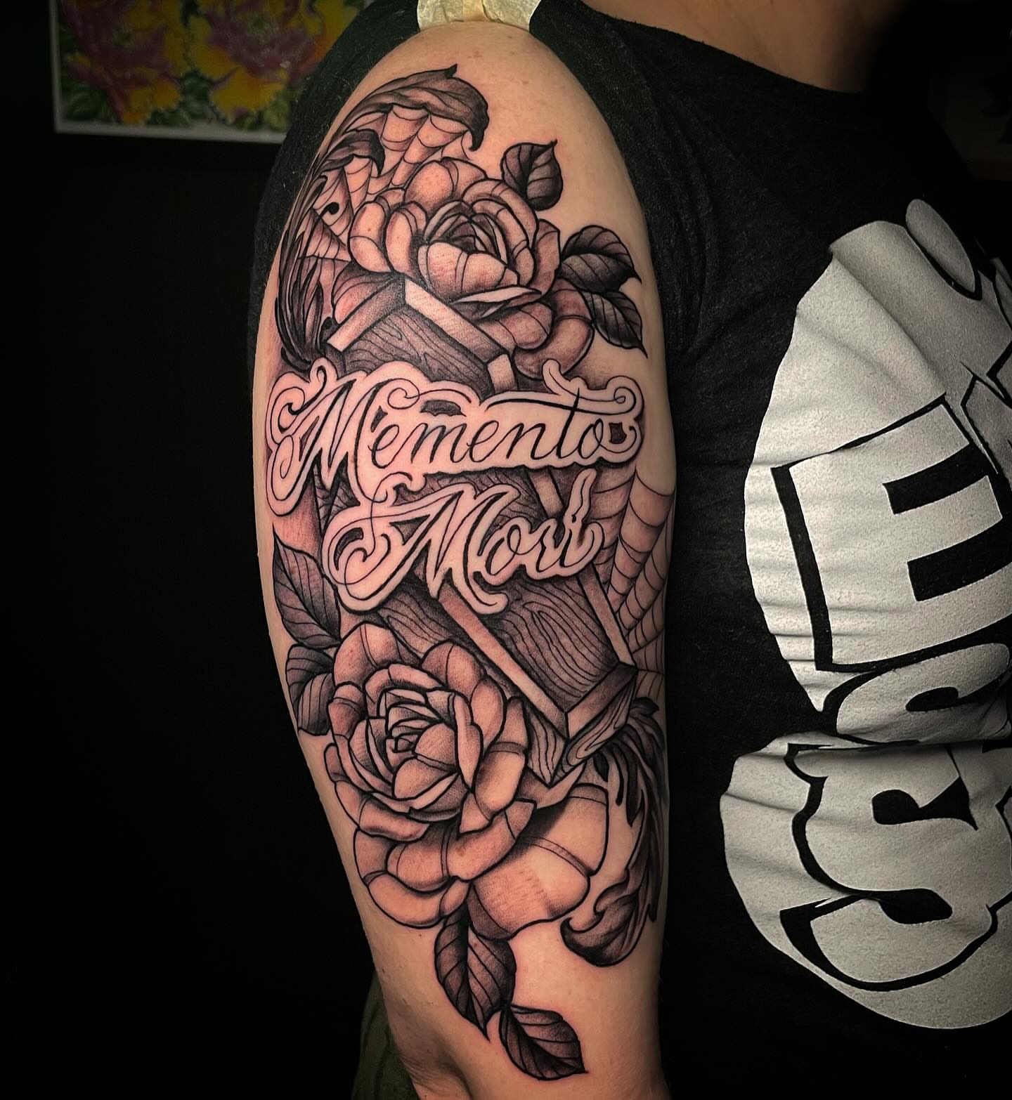 Memento mori realism tattoo on the upper arm by JoDee Yates