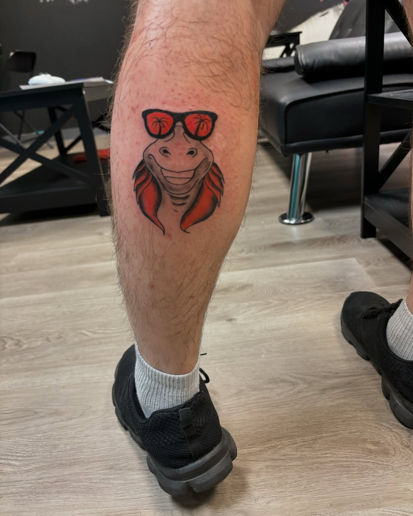 Hippo wearing sunglasses new school tattoo on the leg by Jessica π