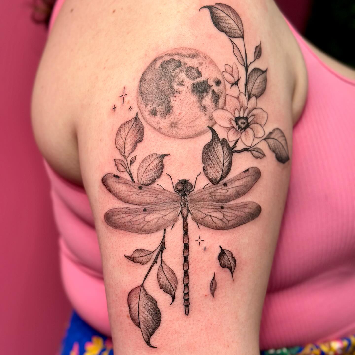 Dragonfly and moon realism tattoo on the shoulder by Jakki Hicks