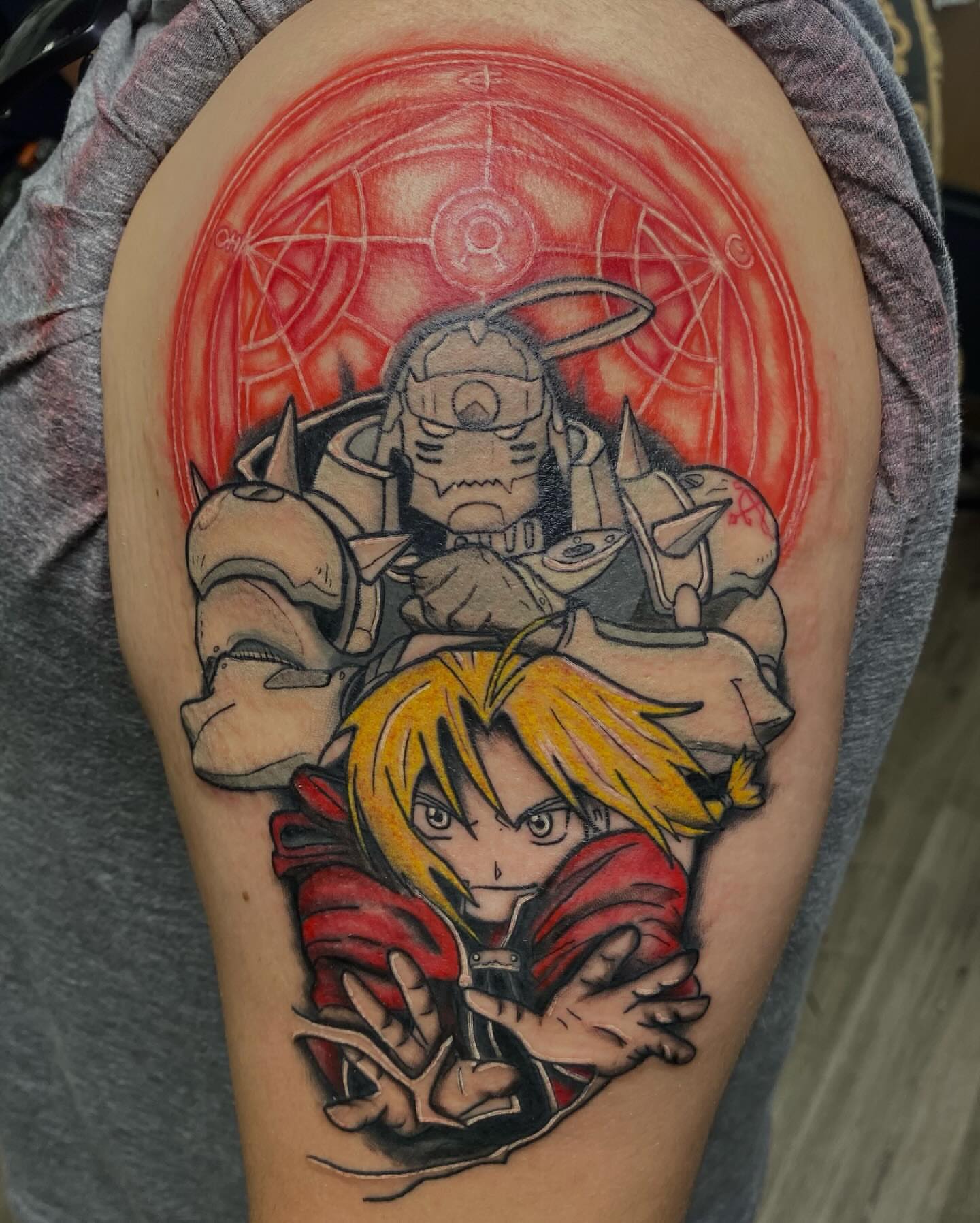 Fullmetal alchemist anime tattoo on the thigh by Ryan Walker