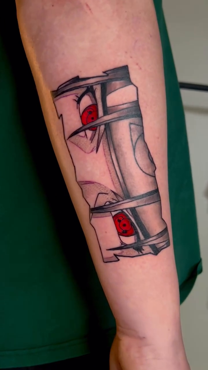 Itachi Uchiha's Sharingan anime tattoo by Ashley Fino, Las Vegas, Nevada