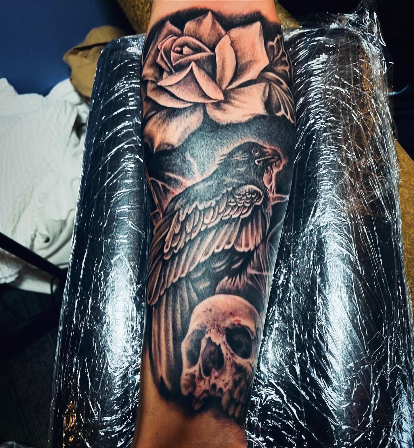 Tattoo by @jaz.ravenink — black_and_grey, realism