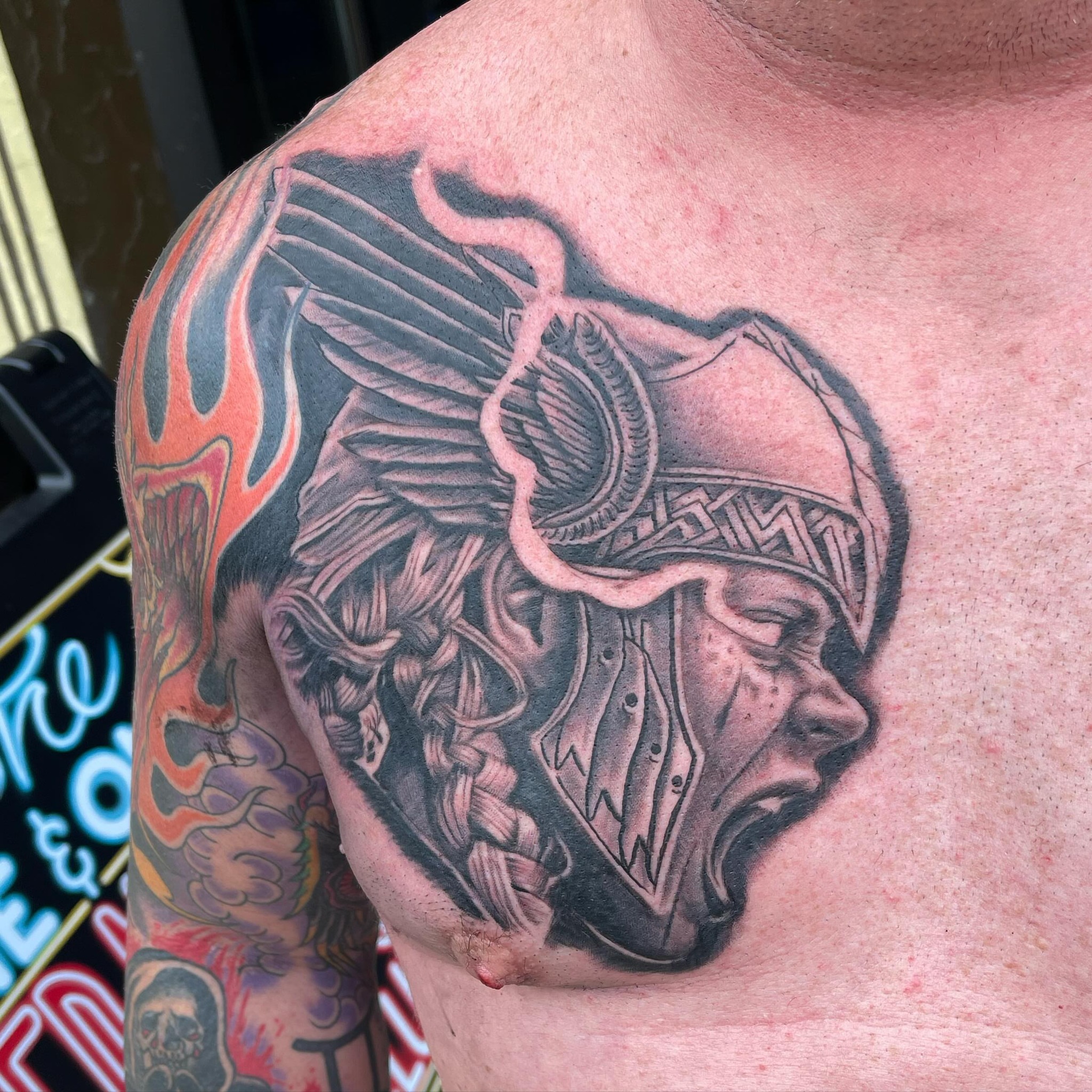 Helmeted warrior realism tattoo on the chest by David Gottschalk