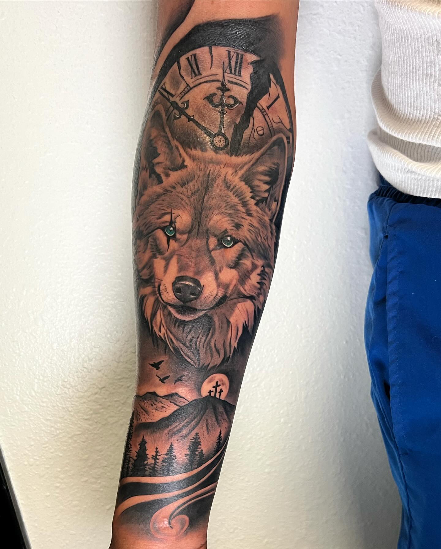 Wolf realism tattoo on the forearm by Angels tattoo
