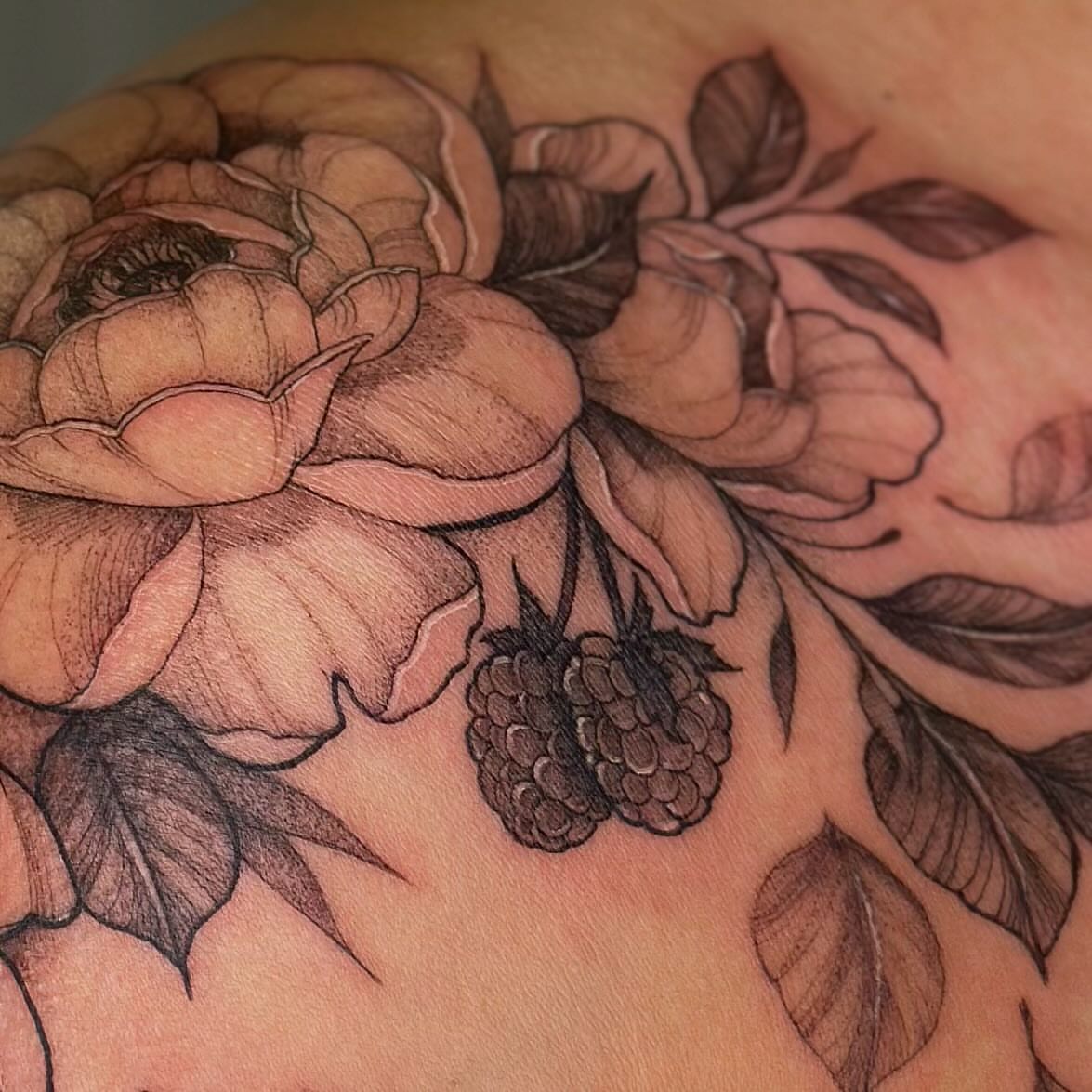 Peony flowers black and grey tattoo on the chest by Sabrina, Harrison, New Jersey