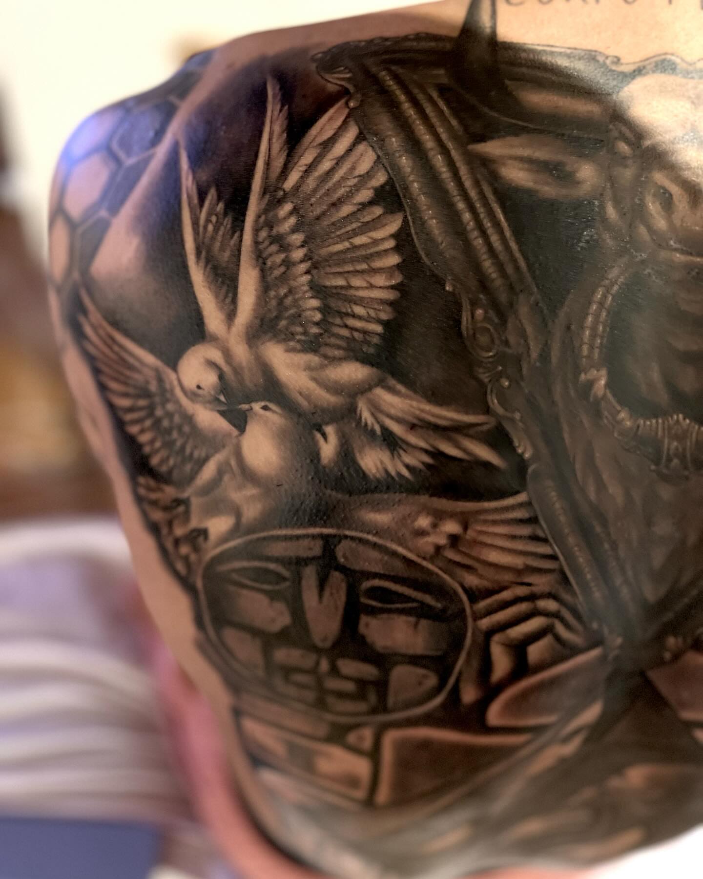 Tattoo by @leftycolbert_official — black_and_grey, realism