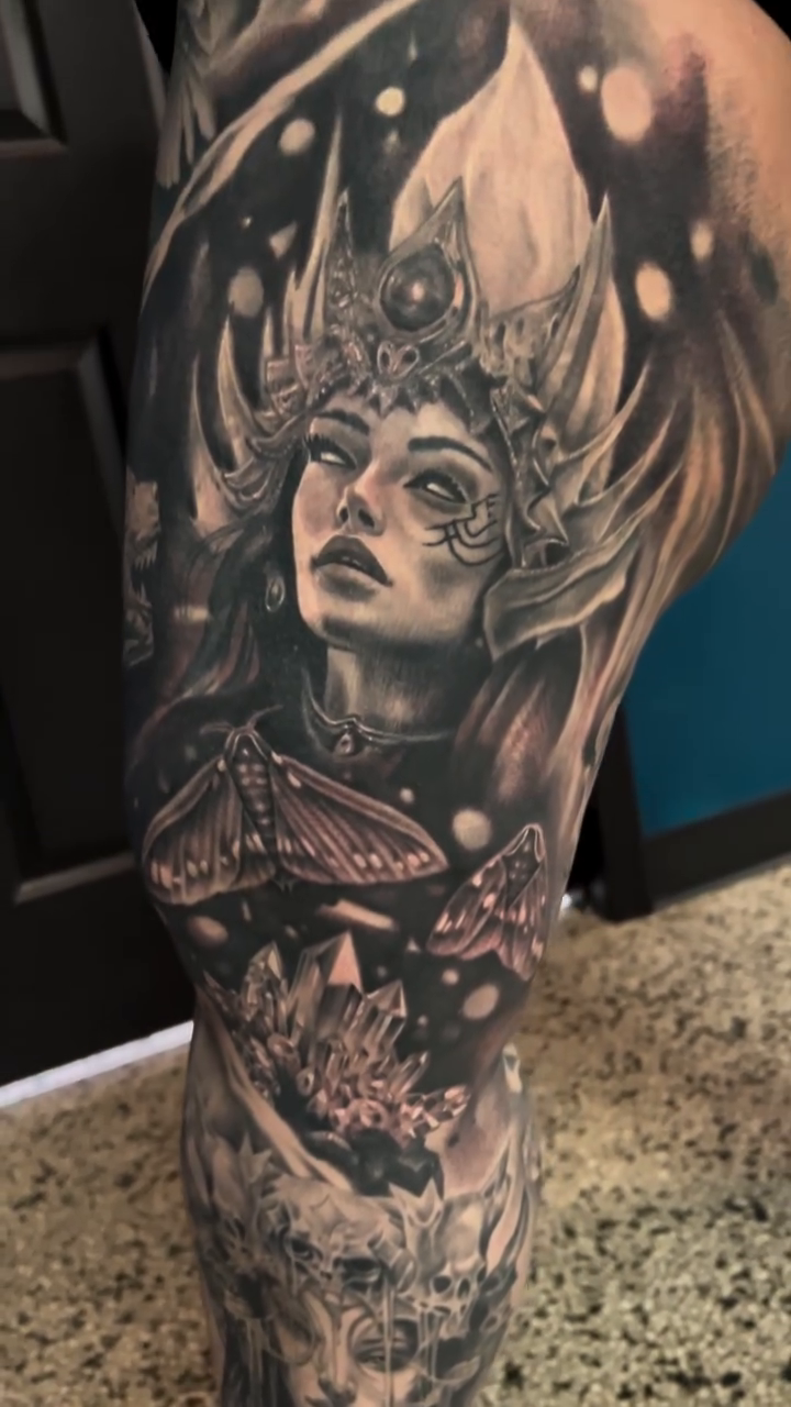Woman with crown and butterflies realism tattoo by Krys King Tattoos
