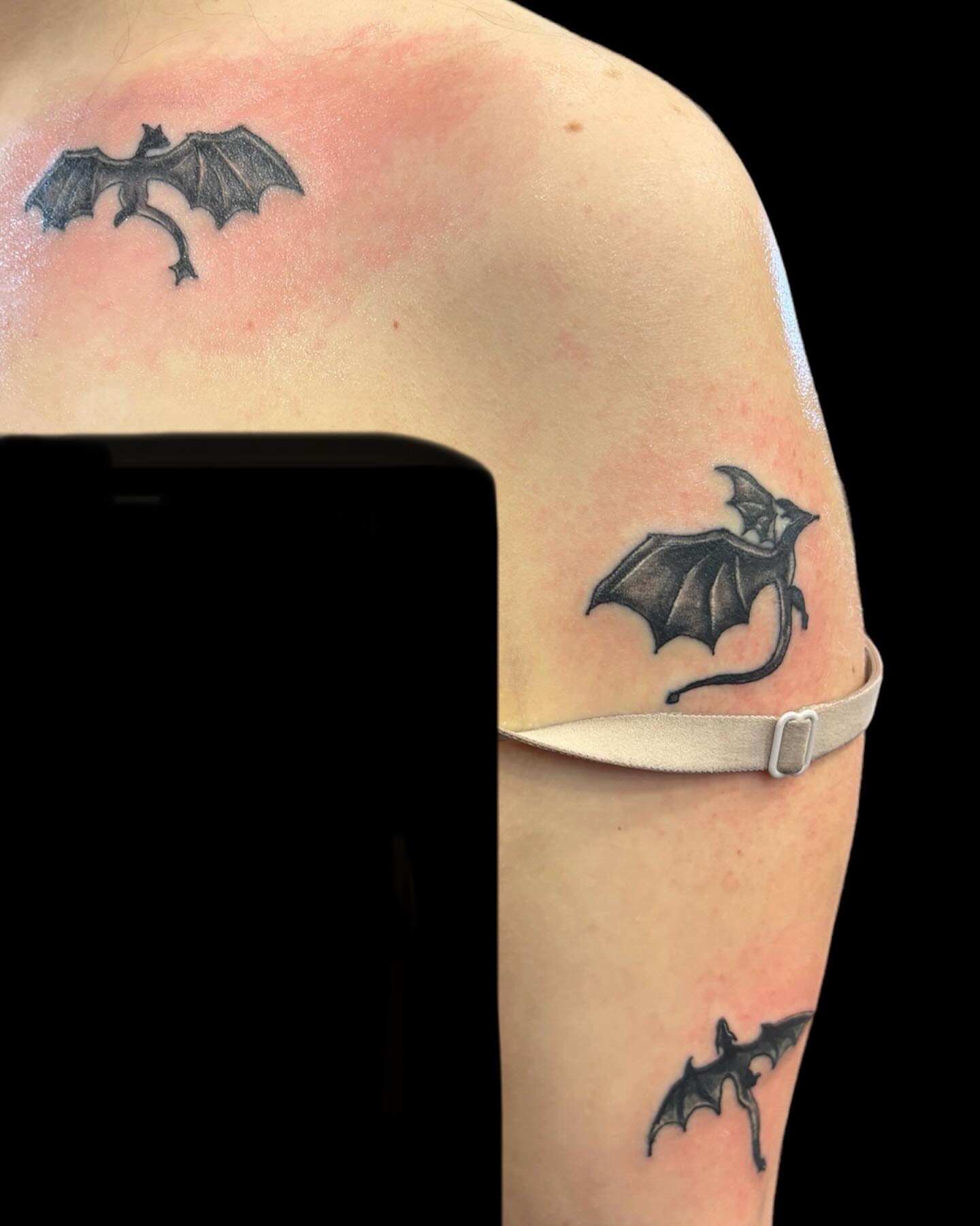 Bat black and grey tattoo on the forearm by Dale Martin