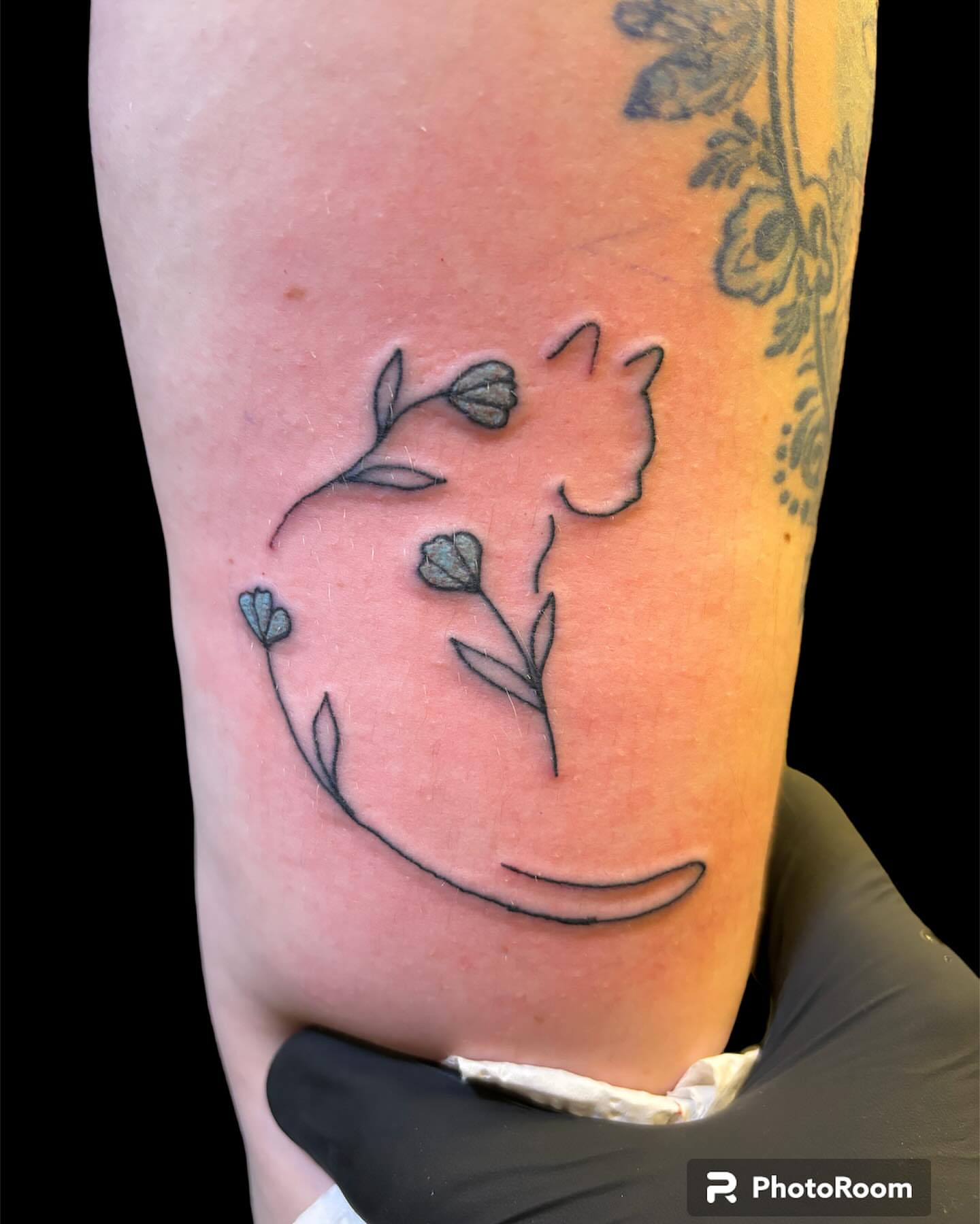 Flowers minimalist tattoo on the forearm by Dale Martin