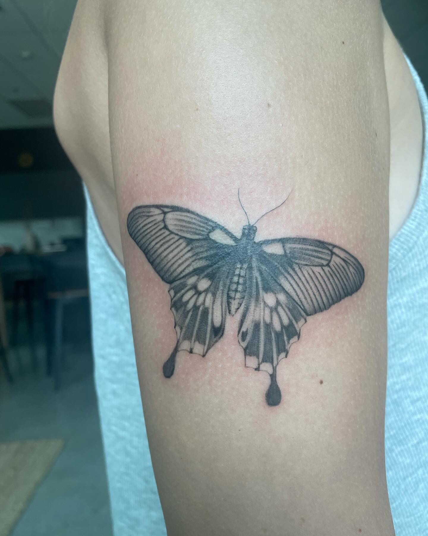 Butterfly black and grey tattoo on the forearm by Tori Bent