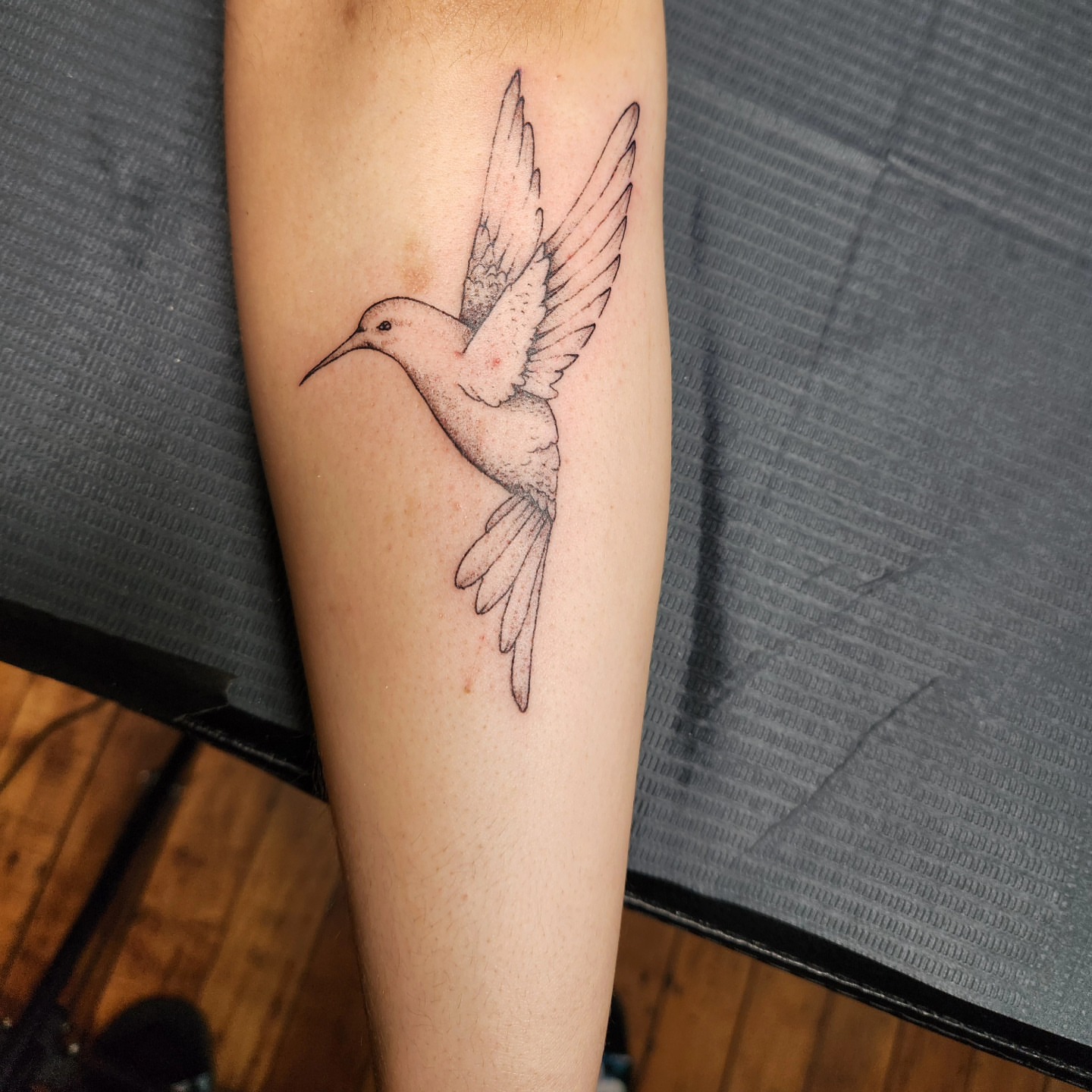 Hummingbird dotwork tattoo on the forearm by Amy Heath