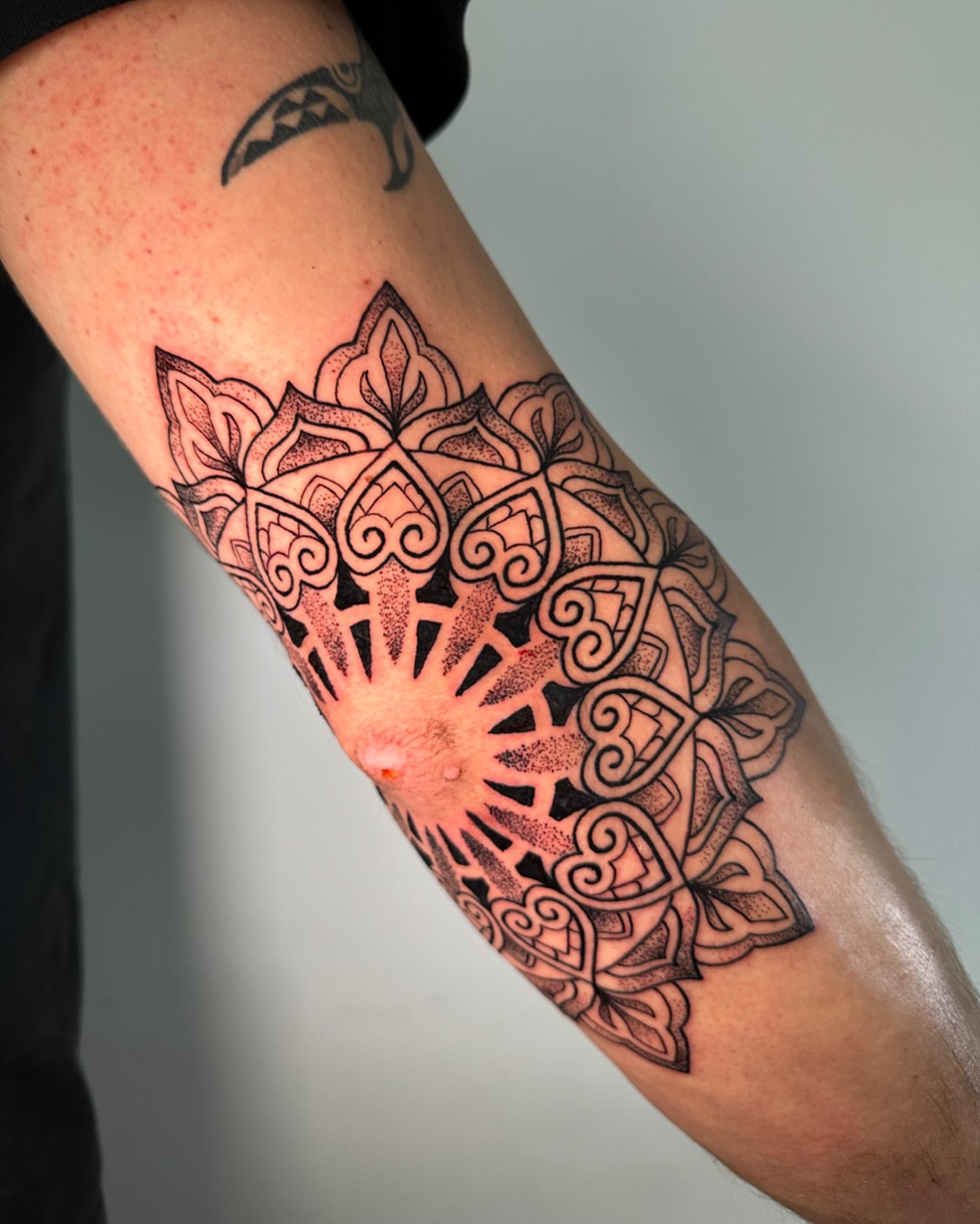 Tattoo by @romanostattoo — dotwork, geometric