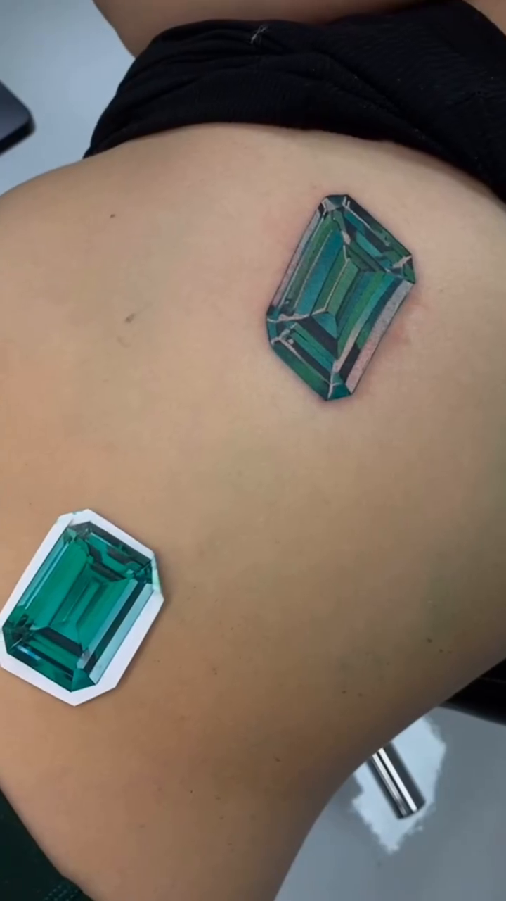 Emerald gem realism tattoo by John Perez
