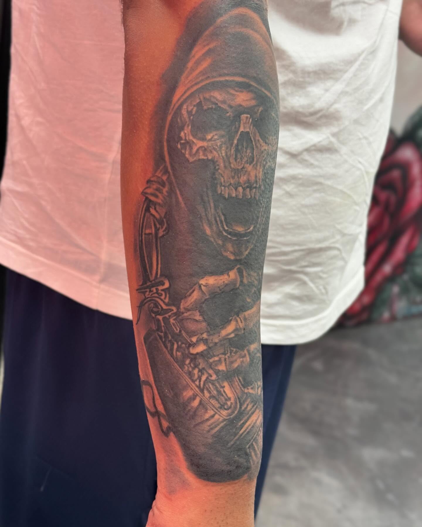 Grim reaper realism tattoo on the forearm by Alejandro Zaragoza