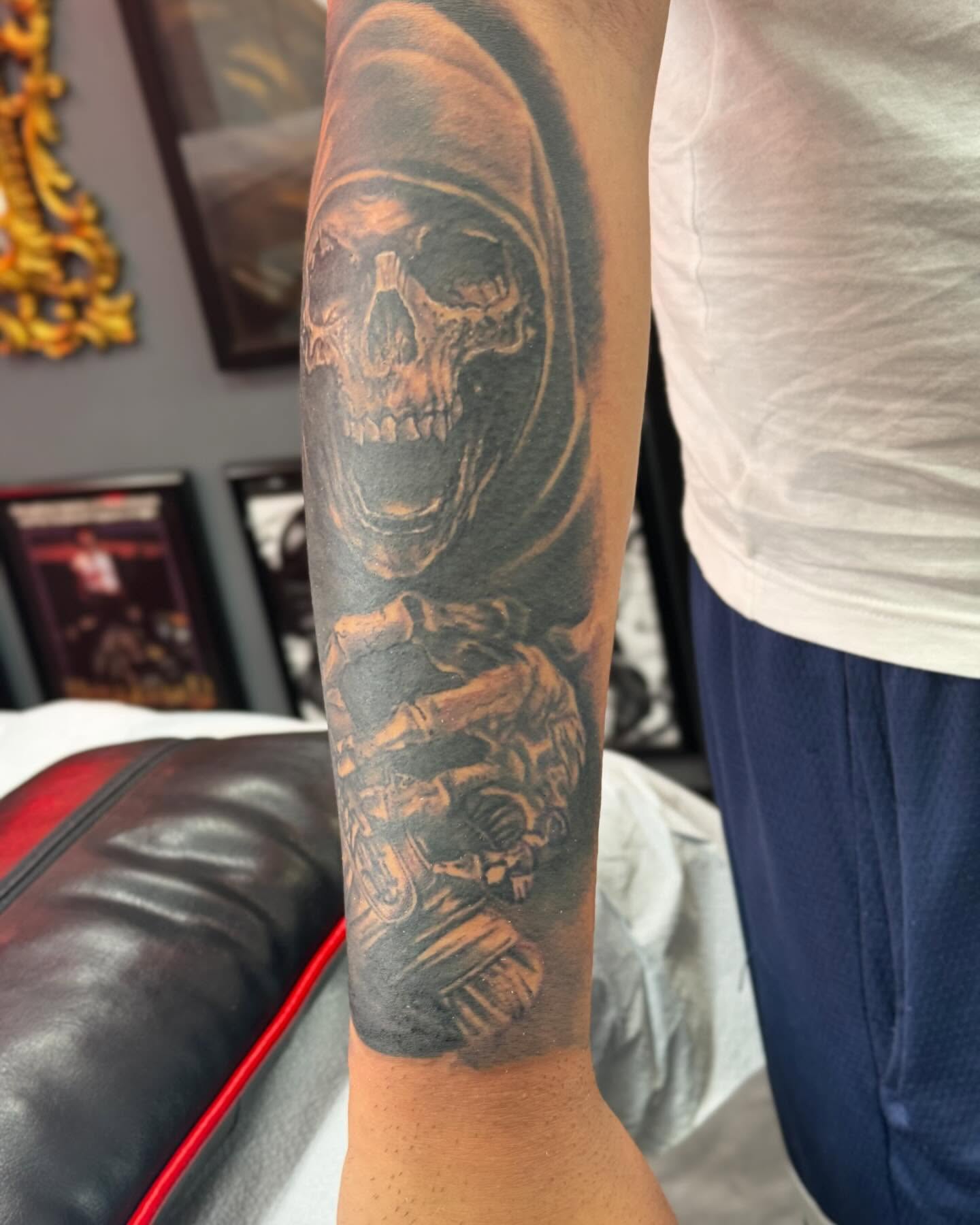 Grim reaper realism tattoo on the forearm by Alejandro Zaragoza