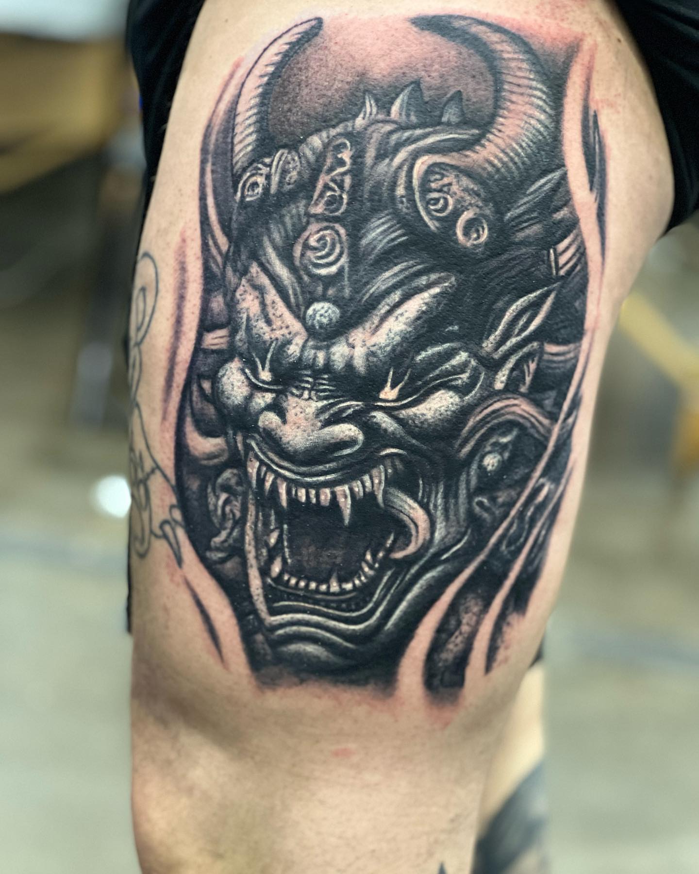 Demon mask realism tattoo on the thigh by 🔥Austin Burke 🔥TATTOO ARTIST