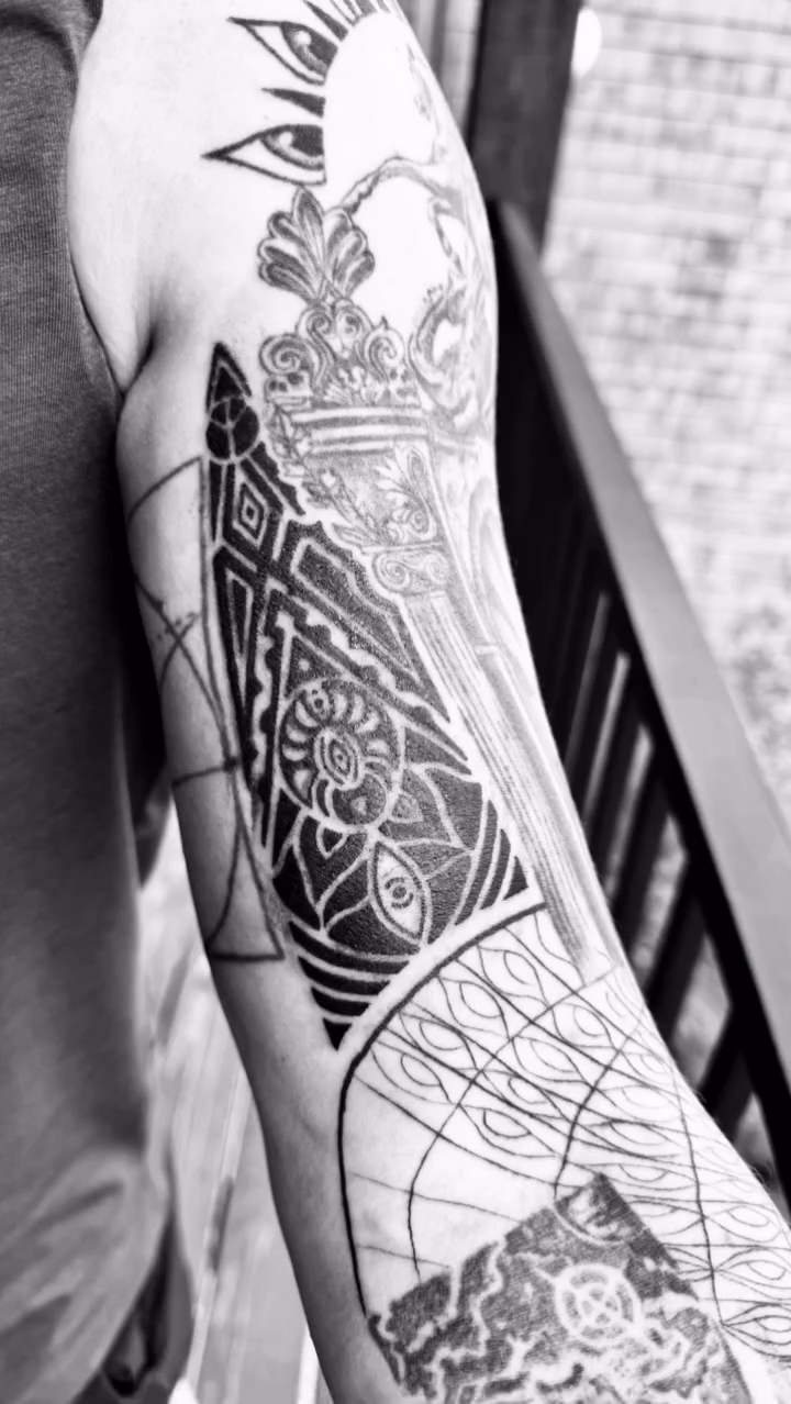 Ornamental sleeve geometric tattoo by Tattoo Artist