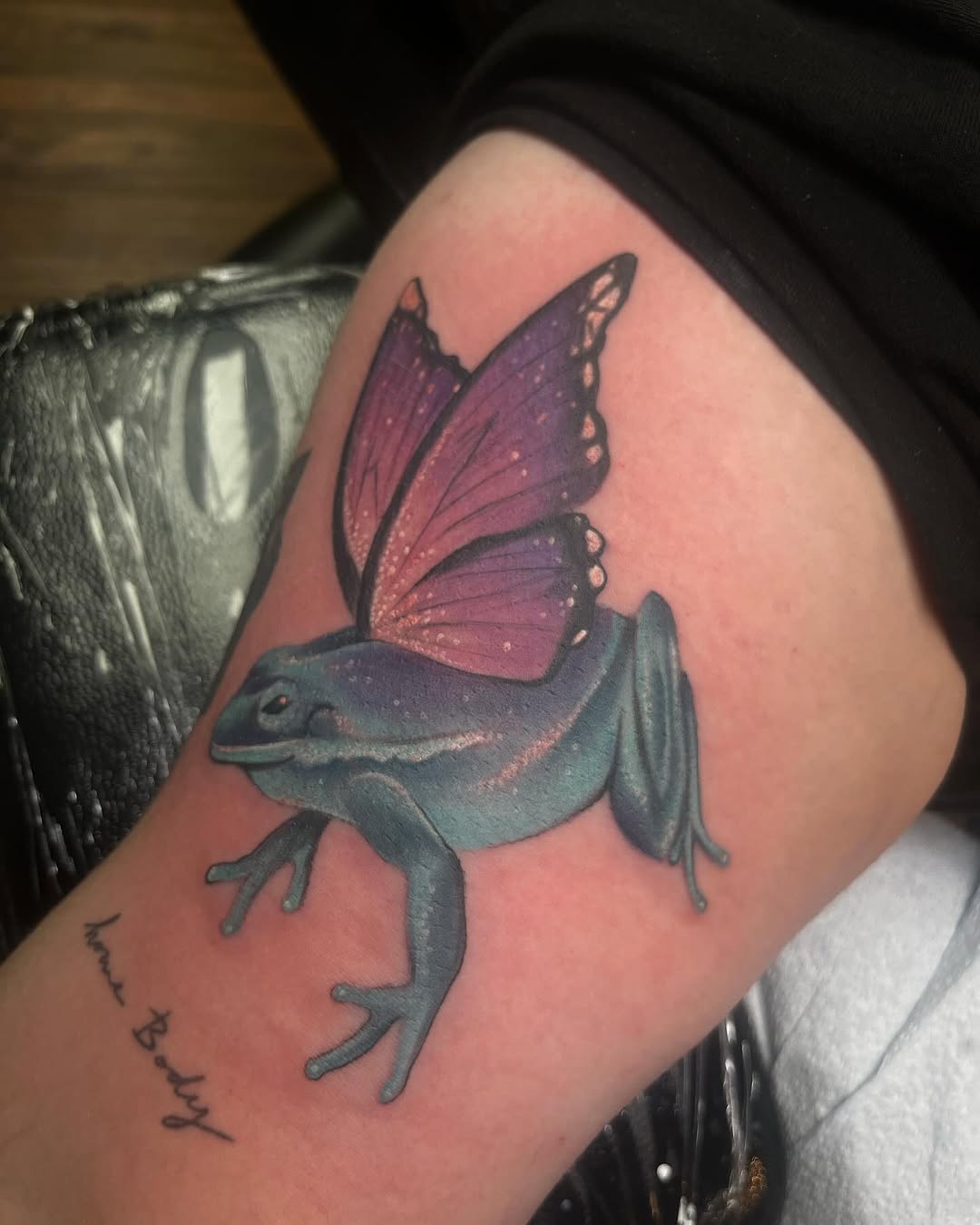 Frog with butterfly wings fine line tattoo on the forearm by Teagan Rachel, Millcreek, Utah