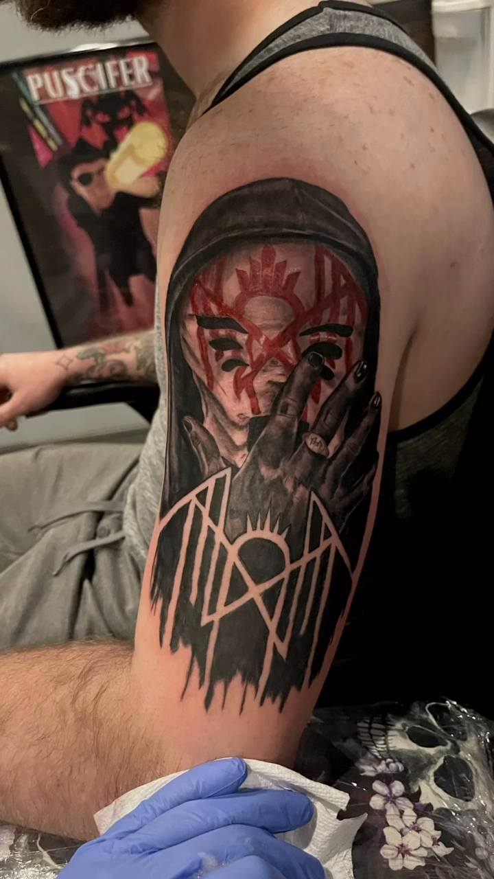Figure with sun and hands dark realism tattoo by Antonio Massimino