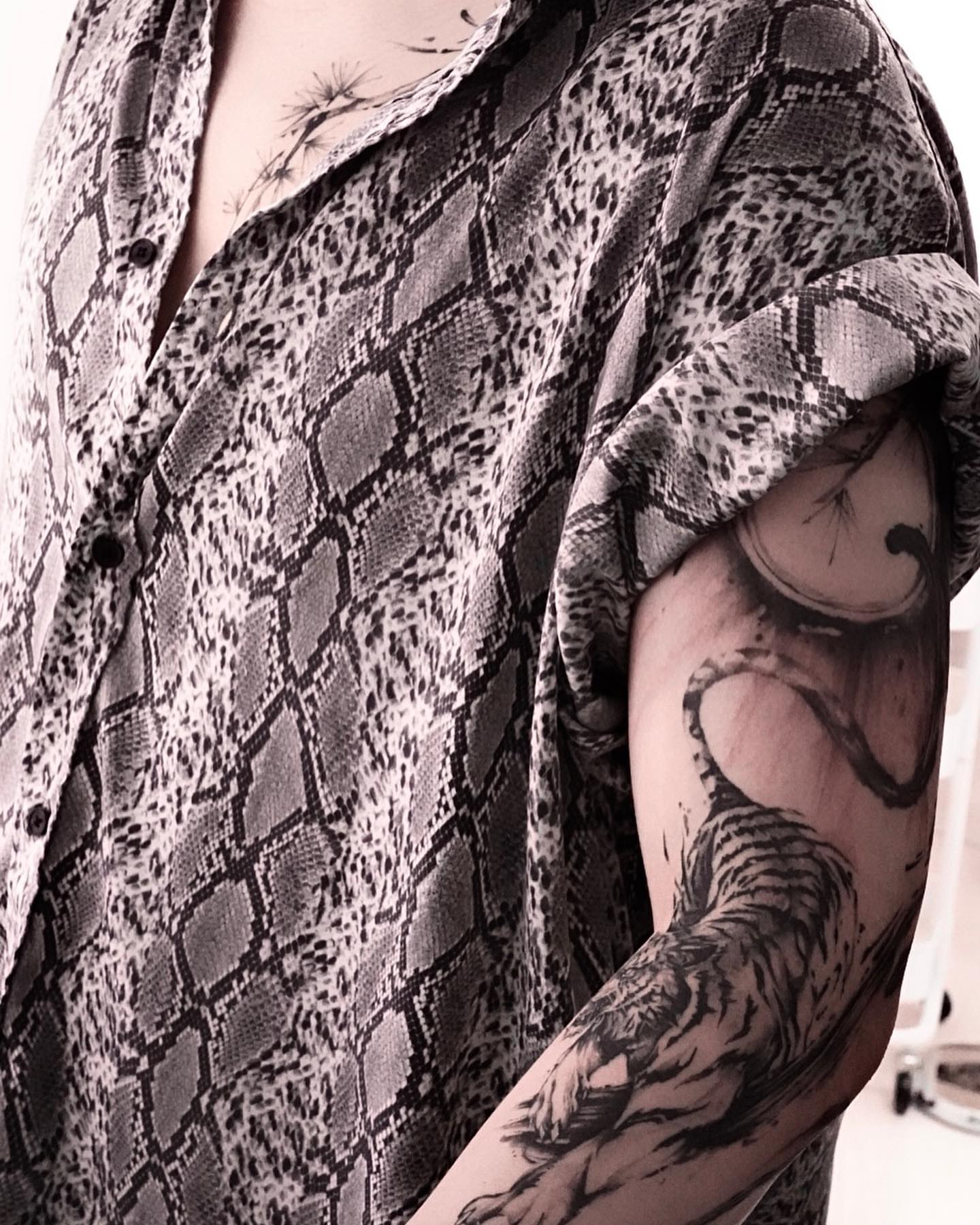 Tattoo by @dowoo_tattoo — black_and_grey, realism