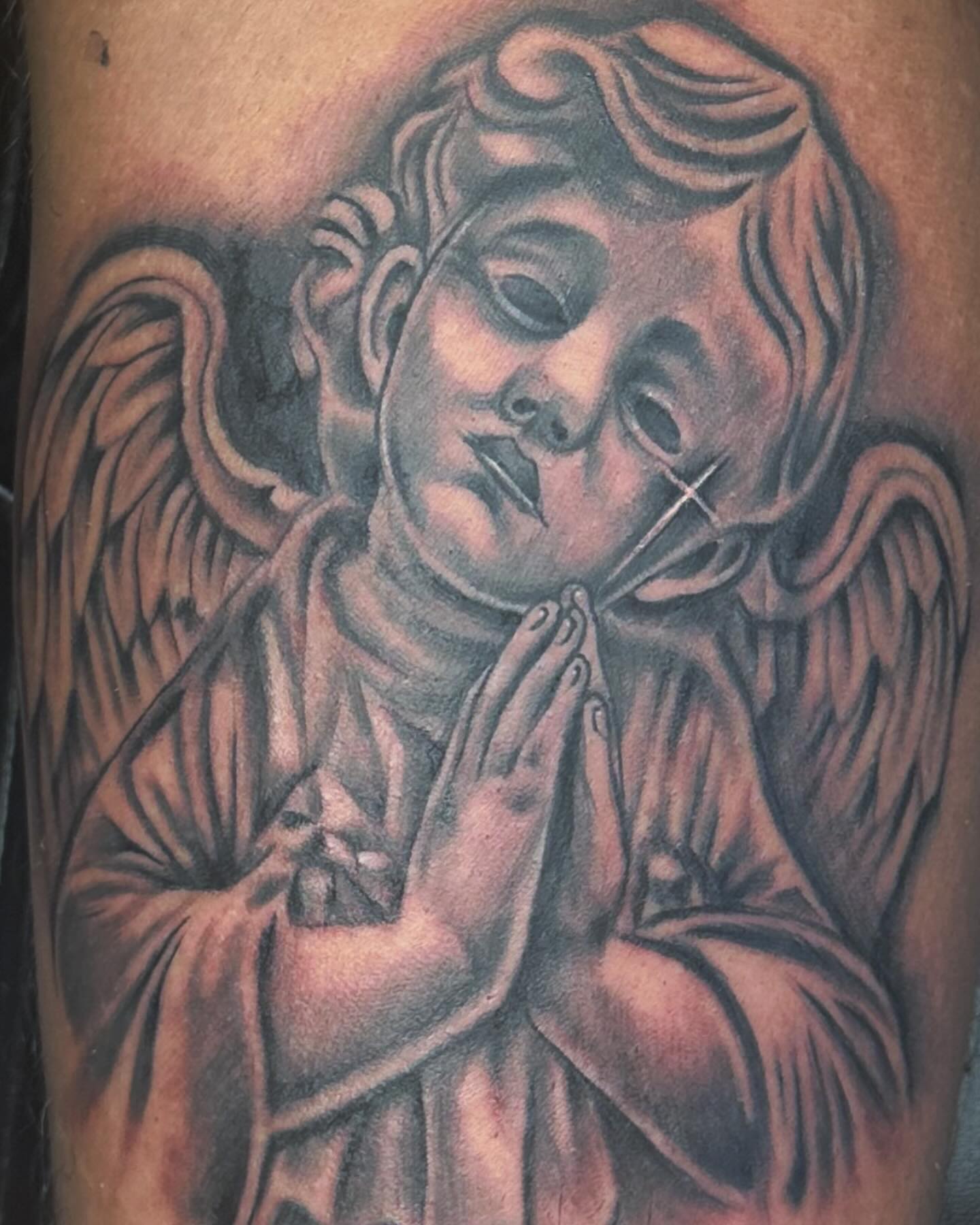 Praying angel realism tattoo on the forearm by Myles Manuel Lopez, Phoenix, Arizona