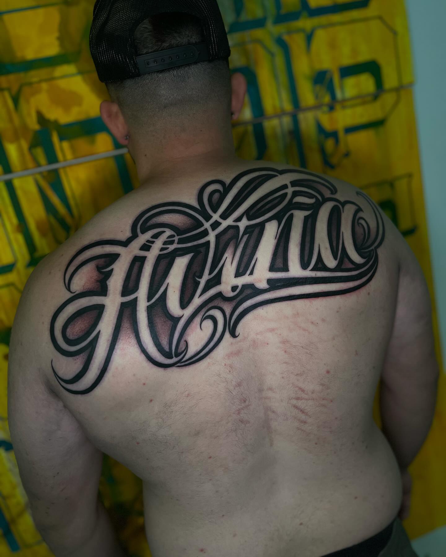 Script lettering lettering script tattoo on the back by Aleckzi Ramos