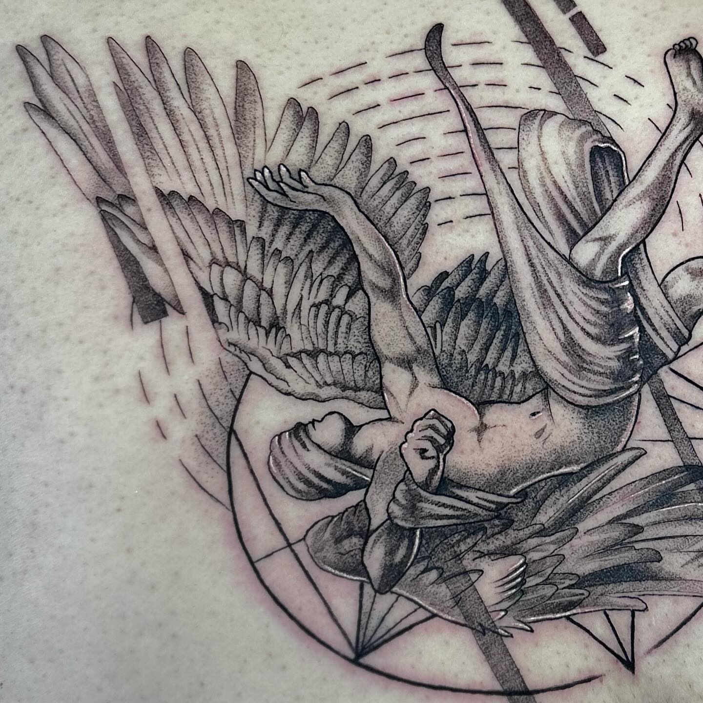 Angelic figure dotwork tattoo on the torso by Juan Carlos