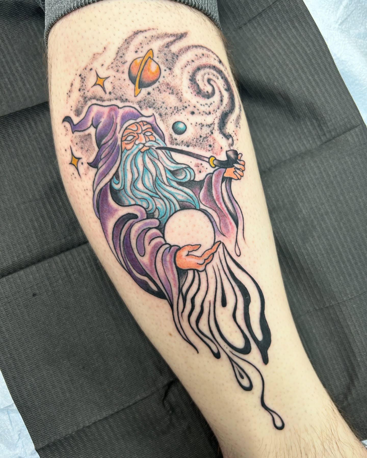 Wizard illustrative tattoo on the forearm by Patricia Cunningham