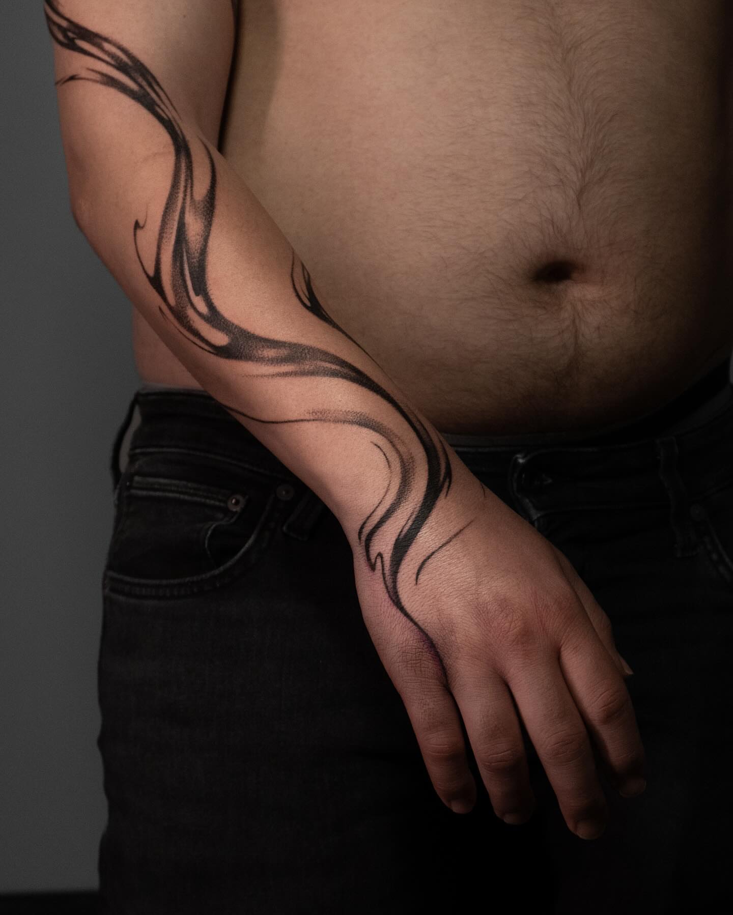 Tribal flame tribal tattoo on the forearm by Pietro Moleti