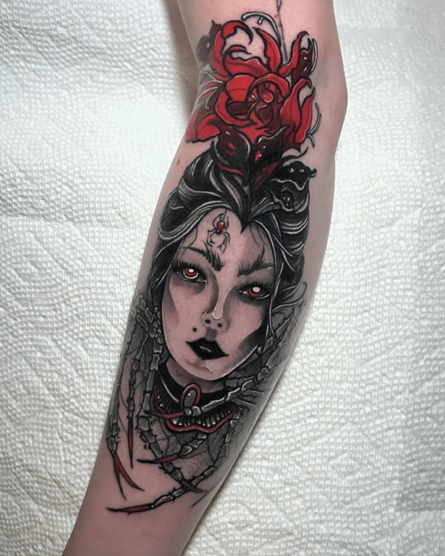 Woman with roses dark realism tattoo on the forearm by Naysla Droguett