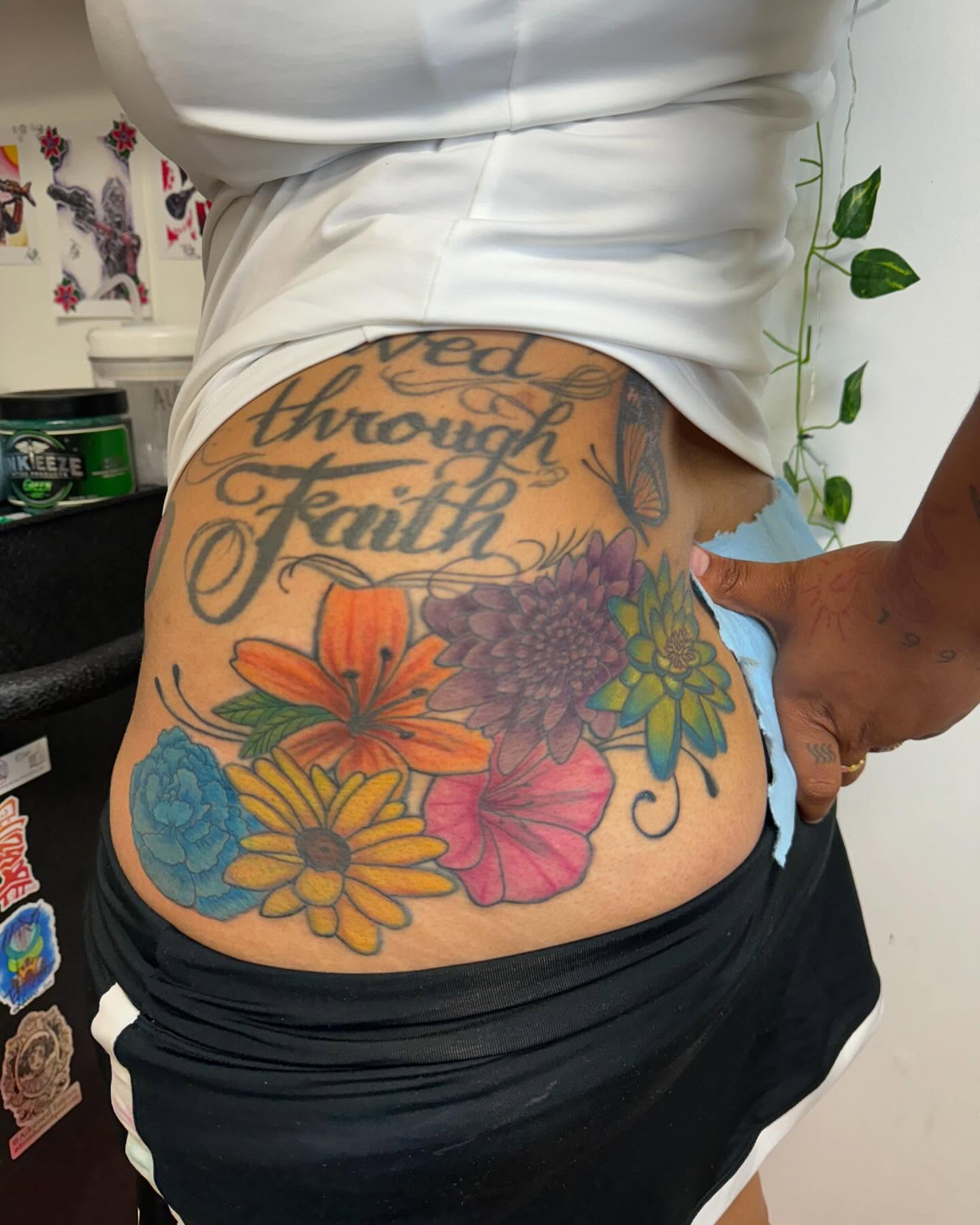 Flowers and faith new school tattoo on the torso by Breanna💉🔮, Dover, Delaware