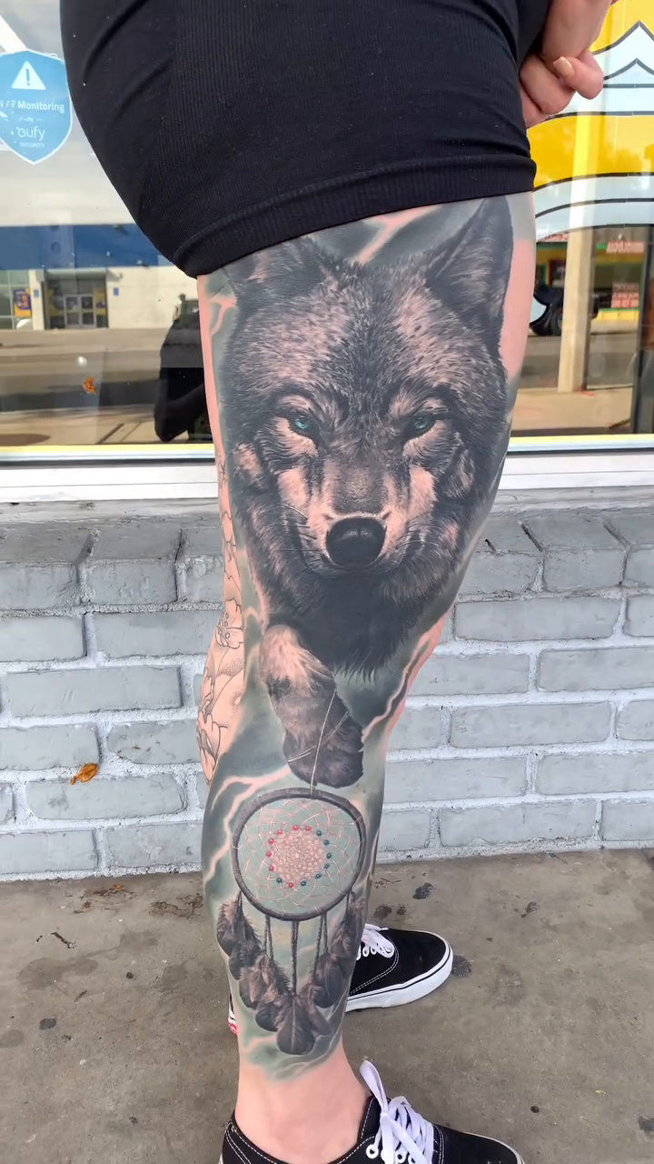 Wolf and dreamcatcher realism tattoo by 🦇𝖀𝖙𝖆𝖍🦇, Las Vegas, Nevada