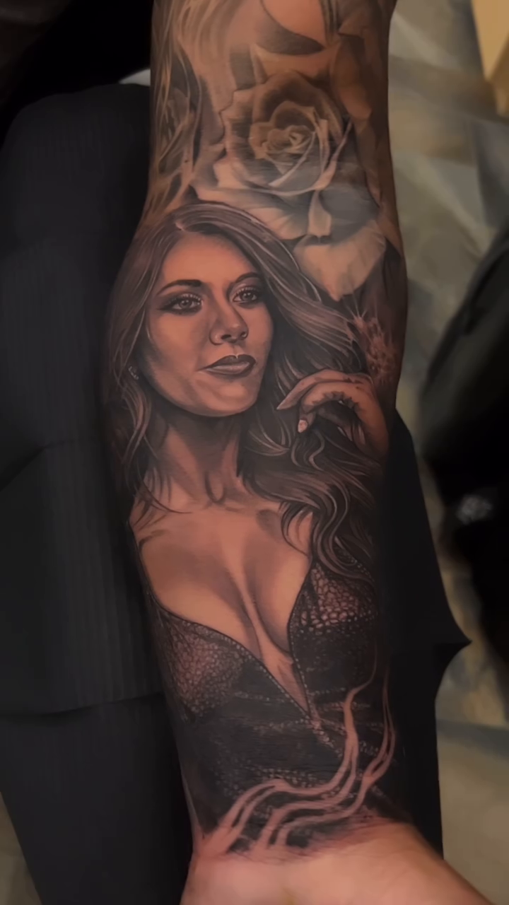 Portrait of a woman with roses realism tattoo by @young_sely