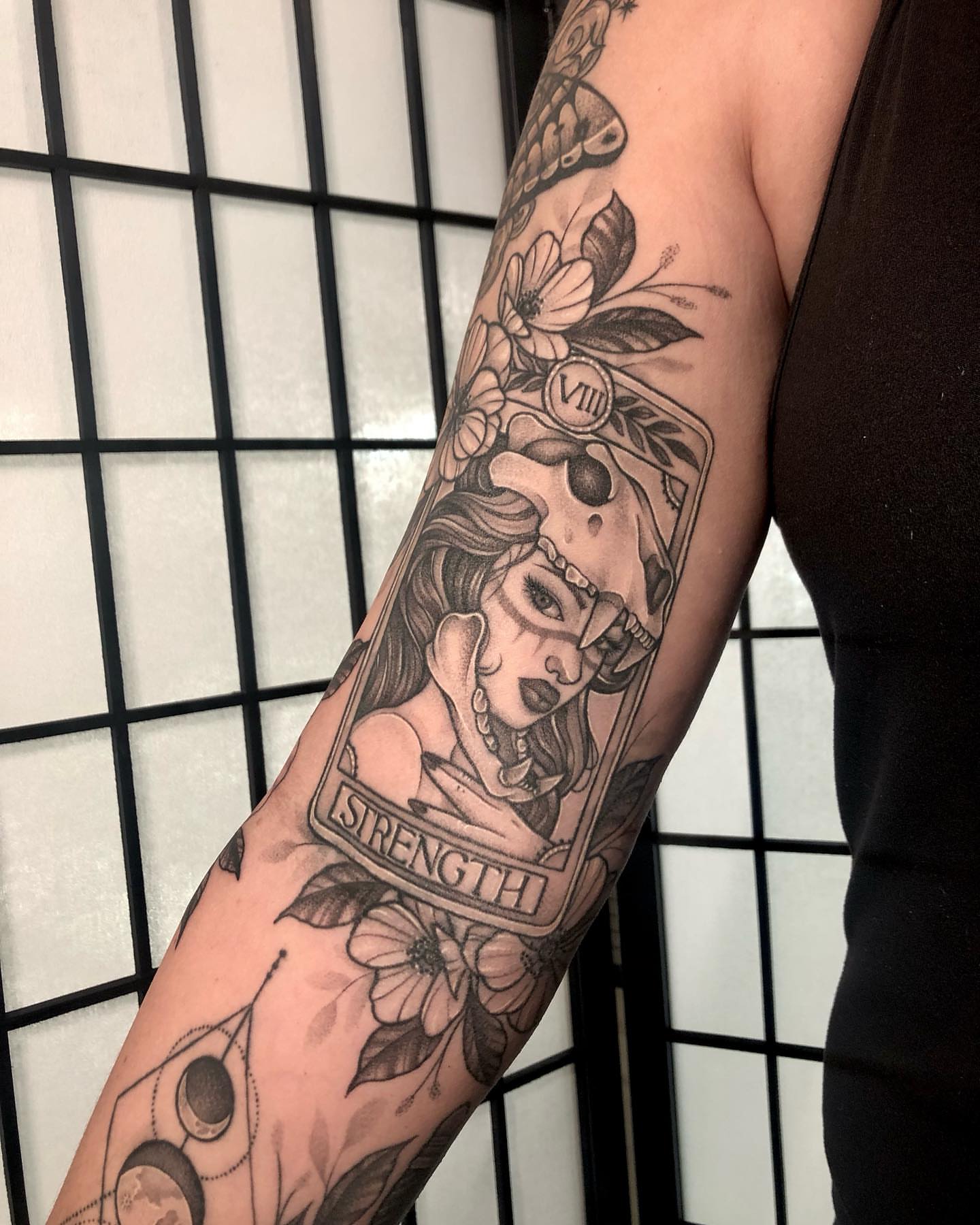 Strength tarot card realism tattoo on the forearm by 𝔍𝔢𝔫𝔫𝔦𝔢 𝔗𝔦𝔢𝔰𝔪𝔞𝔫