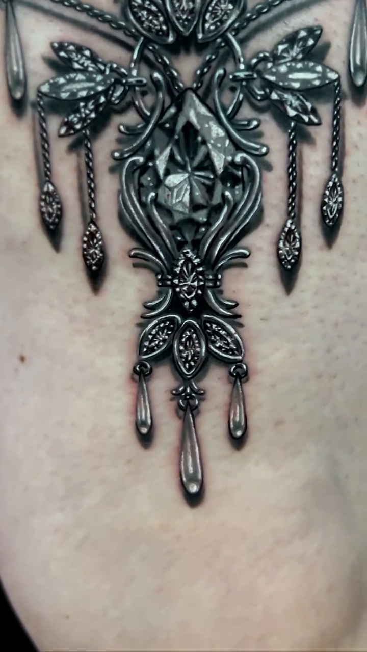 Ornate jeweled pendant ornamental tattoo by Amber Jane Strange