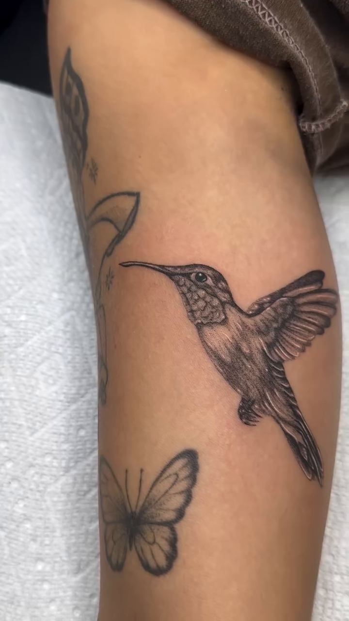 Hummingbird and butterfly realism tattoo by Mystikal Blue Casares