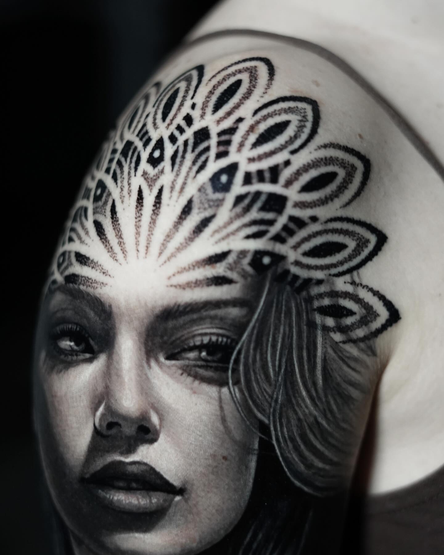 Woman's face realism tattoo on the shoulder by Luis Gil
