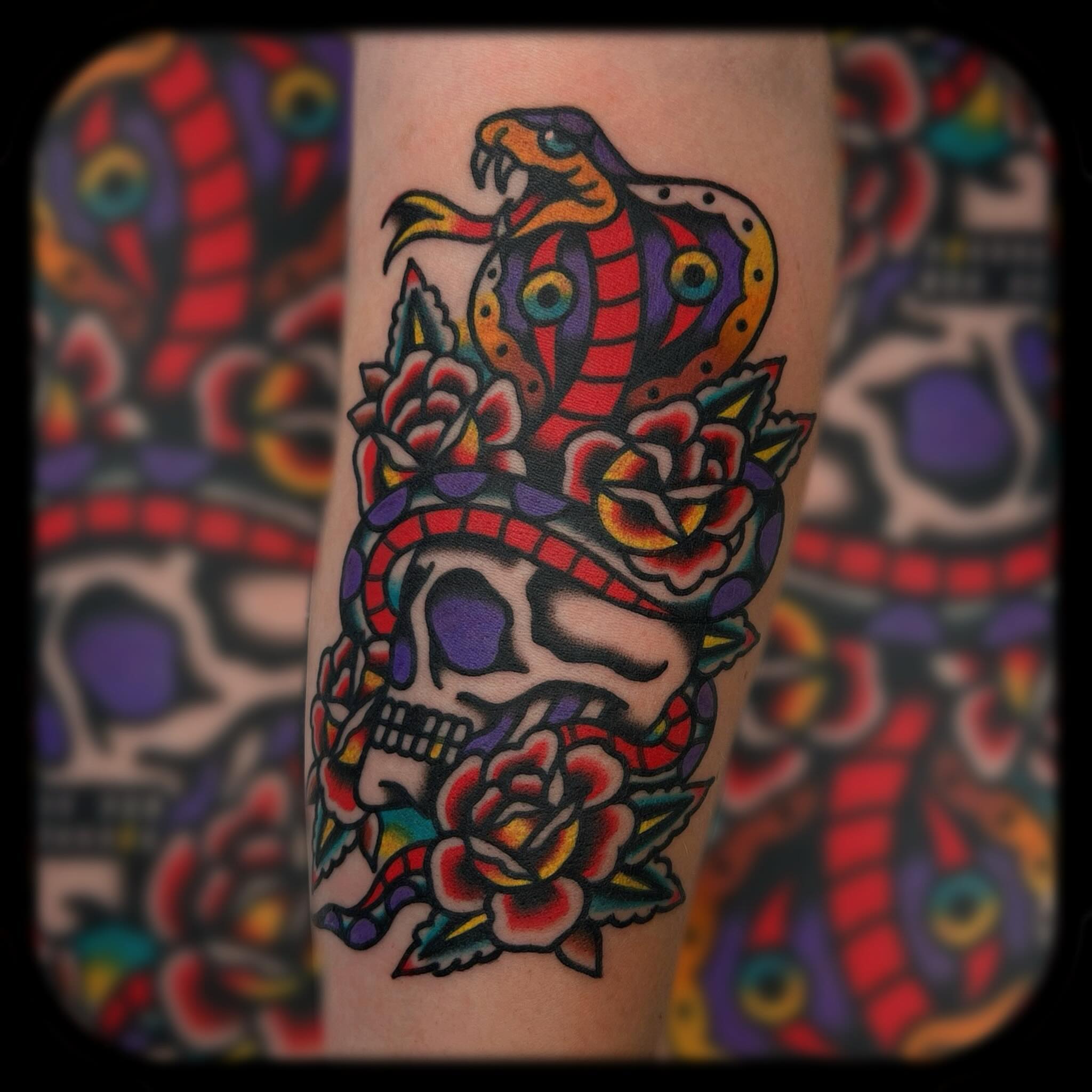 Snake and skull American traditional tattoo on the forearm by Benjamin Ward