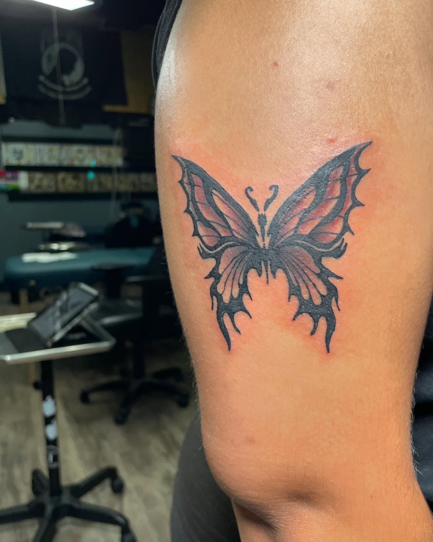 Butterfly realism tattoo on the forearm by Mark Johnson [Tattoo Artist]