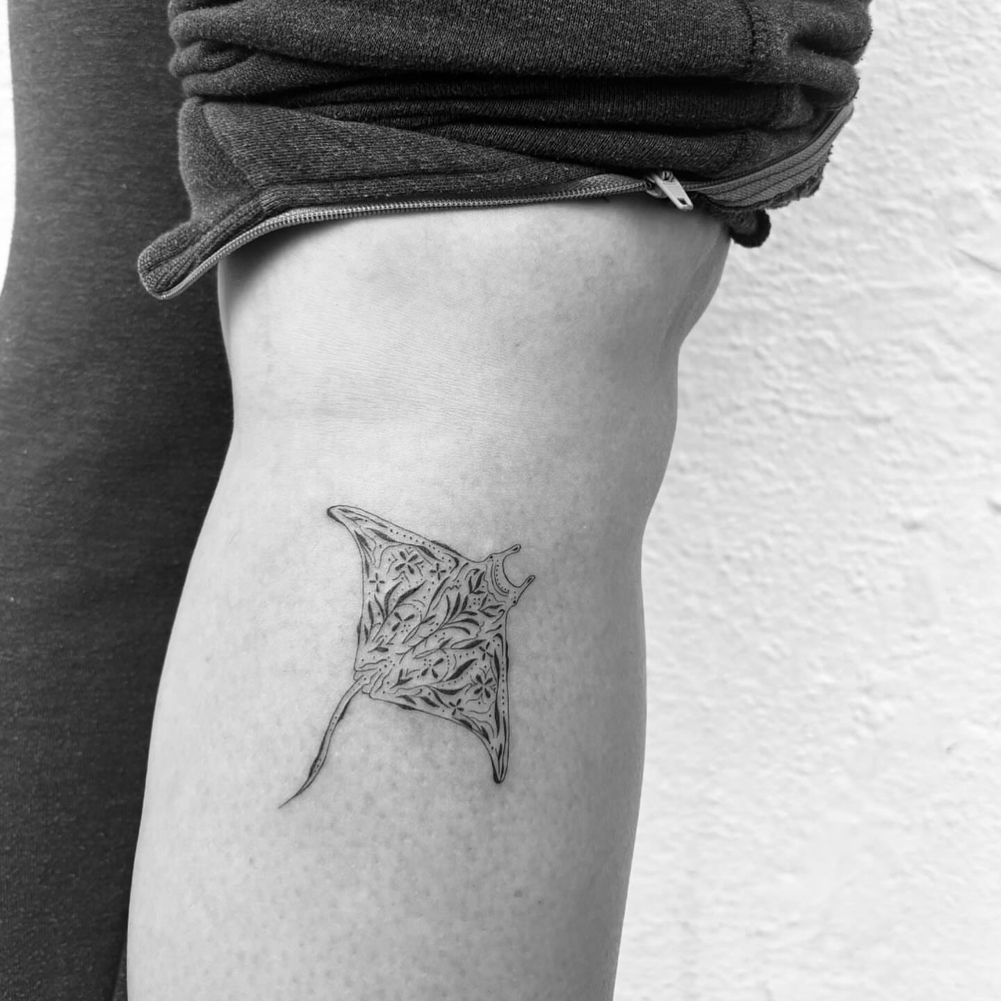 Ray black and grey tattoo on the forearm by Mady