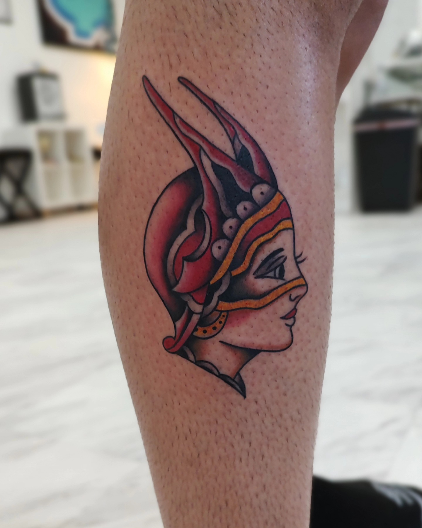 Woman's profile American traditional tattoo on the forearm by Herc