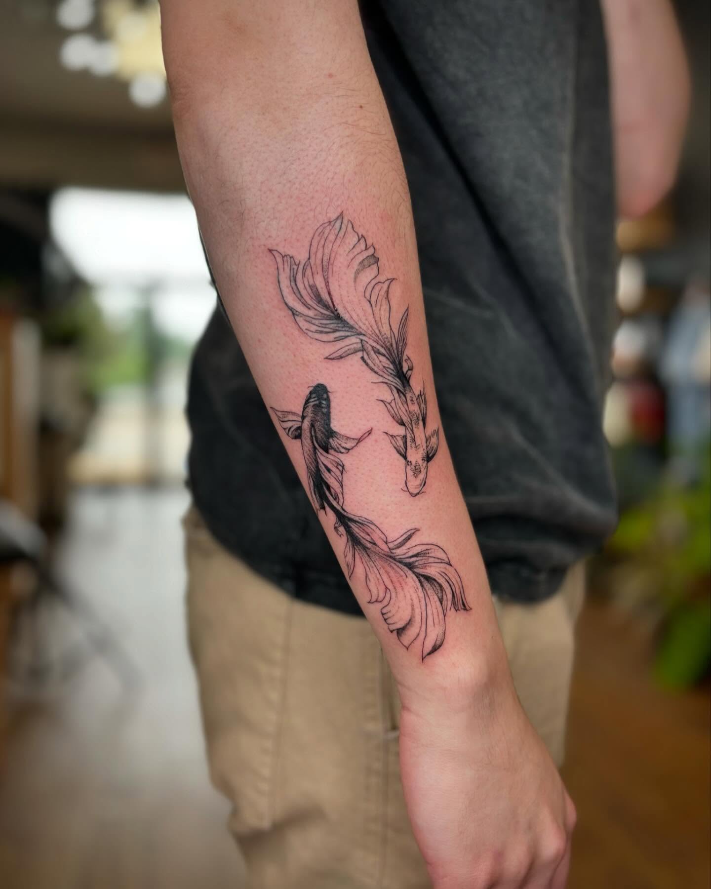 Koi fish black and grey tattoo on the forearm by Harley Lane ๐ซ